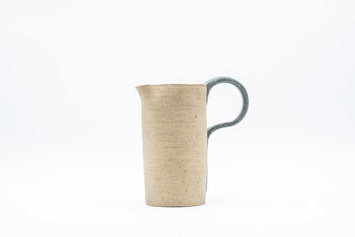 Large handmade ceramic pitcher sandy beige