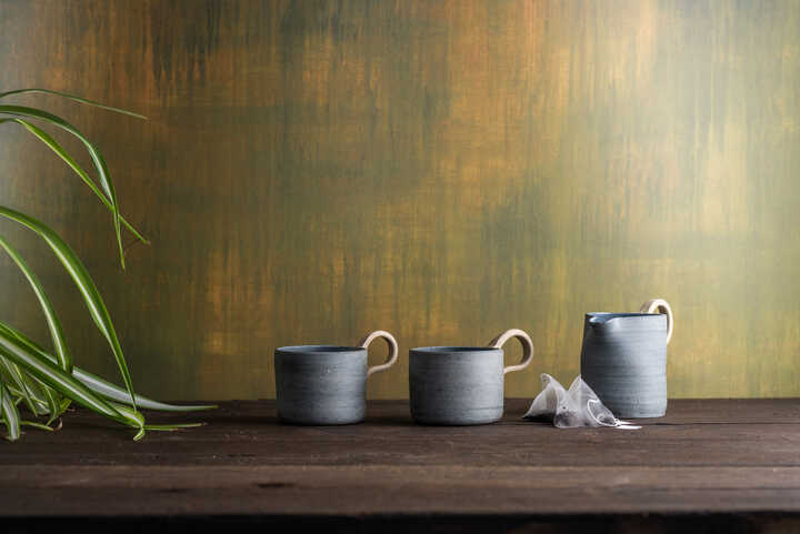 two handmade ceramic cups & a jug